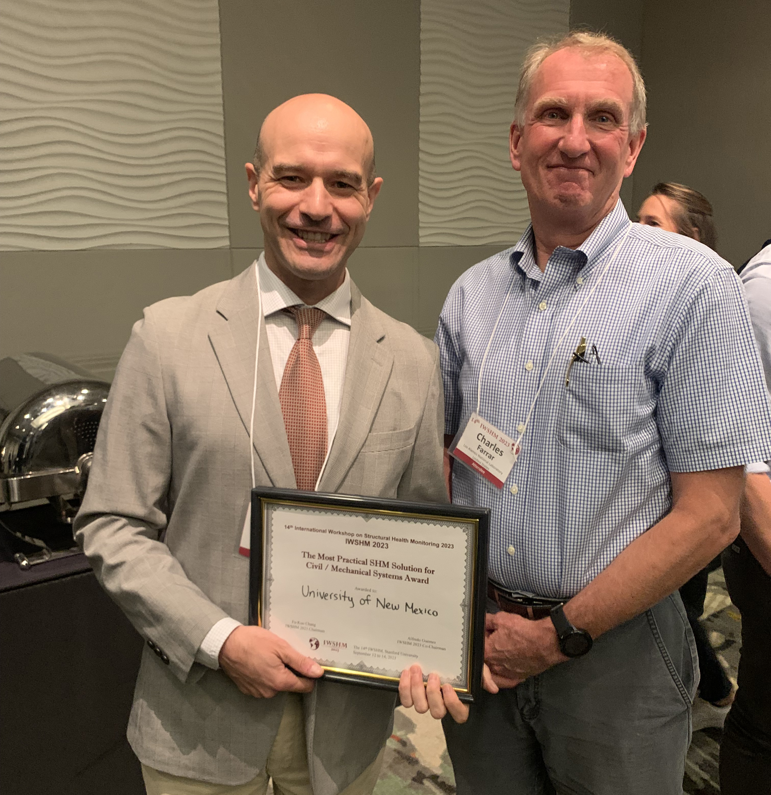 photo: Fernando Moreu with Chuck Farrar after receiving the SHM in Action award at Palo Alto on Sept. 13. Farrar is a UNM alumni in civil engineering and the director of the Engineering Institute at Los Alamos National Laboratory.